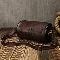 Features: 100% full grain leather L 10.2 x H 5.5 Inch About 1.5 Ibs One external zipper pocket One hidden zipper pocket Button/zipper closure entry to main section Adjustable leathercanvas strap Chunky Sandals, Men Vintage, Leather Bucket, Small Bag, Saddle Bags, Vintage Men, Camera Bag, Messenger Bag, Leather Bag