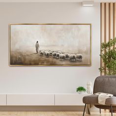 a painting hanging on the wall above a chair