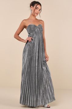 Cheers to a glam and gorgeous night out in the Lulus Glittering Luxury Silver Lurex Pleated Strapless Maxi Dress! Lightweight woven fabric boasts sparkling, silver Lurex threading as it shapes a sweetheart neckline (with hidden no-slip strips) and a strapless, plisse-textured bodice with a cinched, bow-like design. High empire waist tops a cascading, pleated A-line skirt that falls to a sweeping maxi hem. Hidden back zipper/clasp. Fit: This garment fits true to size. Length: Floor length. Size m Lurex Dress, Empire Waist Tops, Adhesive Bra, Strapless Maxi, Strapless Maxi Dress, Pleated Maxi Dress, Pleated Maxi, Strapless Bra, Full Skirt