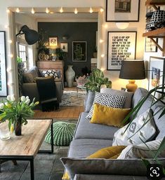 a living room filled with furniture and lots of plants on top of it's tables