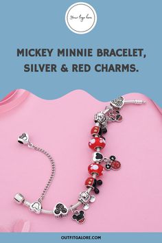 Our Red and Silver Charm Bracelet with a Mickey and Minnie Pendant is the perfect addition to any Disney fanatic's collection. This classic design is simply stunning and will add a whimsical touch to your jewelry box. The pendant featuring the beloved characters Mickey and Minnie is absolutely charming and will make your heart melt. Don't miss out on this must-have bracelet! Themed Silver Jewelry For Disney Fan Events, Disney Sterling Silver Jewelry In Silver, Disney Silver Bracelet Gift, Disney Silver Bracelet For A Gift, Silver Disney Charm Bracelet Gift, Silver Disney Bracelet For Gift, Silver Disney Charm Bracelet As A Gift, Silver Disney Bracelet As Gift, Disney Silver Charms Jewelry