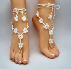 "One pair of crochet butterflies barefoot sandals. Made to Order - Choose your color. Great for beach or outdoor weddings (\"something blue\"), bridesmaids gifts, yoga, luau parties, pool parties or just to make your feet look pretty. Wear them anywhere, anytime, with or without shoes. Made to Order One size fits most adults  Handmade with 100% Mercerized Cotton Thread Hand wash cold - lay flat to dry If you would like a different color than offered or an adjustment in size, please \"Contact\" m White Bohemian Barefoot Sandals For Beach Season, White Barefoot Sandals For Summer Festivals, Handmade White Bohemian Barefoot Sandals, White Bohemian Handmade Barefoot Sandals, White Handmade Bohemian Barefoot Sandals, Handmade White Barefoot Sandals For Beach Wedding, Handmade Barefoot Sandals For Spring Party, Handmade White Barefoot Sandals For Summer, Adjustable Crochet Barefoot Sandals For Beach