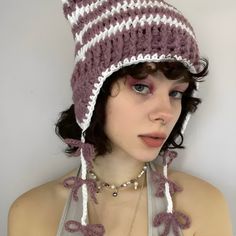 Stay warm and cute with this kawaii cat ear beanie, featuring a fun striped design. It's a delightful accessory for winter, adding a playful and funny touch to your cold-weather outfits. Kawaii aesthetic Striped design Pink, green, blue: strawberry pom pom tie strings Black: star pom pom tie strings Navy, purple: bow p White Trendy Crochet Hat For Winter, Casual Knitted Bonnet With Ear Flaps, Trendy White Crochet Winter Hat, Casual Winter Bonnet With Ear Flaps, Casual Knitted Hat With Ear Flaps, Winter Cotton Crochet Hat, Casual Warm Bonnet With Ear Flaps, Trendy Cat Ears Winter Hat, Casual Cat Ears Beanie For Winter