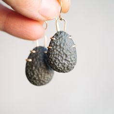 These porcelain Torii earrings were custom textured, carved, and polished. No piece will have the same textured pattern. These soft statement earring that are light in weight. The custom designed prong-setting frames, are inspired by the Torii gate: signaling the transition from the normal everyday world, to the sacred... in this case, I have designated the wearer as the sacred element in how I have designed them. The porcelain sculptures are then custom set using the Torii designed concept, wit Porcelain Texture, Modern Elevation, Contemporary Handmade Jewelry, Art Jewelry Earrings, Contemporary Jewellery Designers, Porcelain Sculpture, Ceramic Jewellery, Torii Gate, Sculptural Jewelry