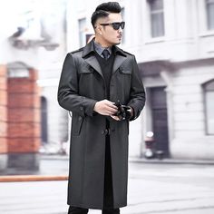 For those with a penchant for style, this long coat is a must-have. Crafted from resilient leather, it perfectly complements the overall modest design. The button details add a touch of elegance to this men's long coat. With its single-breasted button closure, it's a smart investment for your autumn and winter wardrobe. Don't hesitate; order now before stock runs out! Specifications Brand Name: GeraldBlackOrigin: Mainland ChinaCN: ZhejiangApplicable Season: Autumn And WinterMaterial: OtherThickness: STANDARDLining Material: PolyesterApplicable Scene: CasualStyle: Smart CasualOuterwear Type: Leather & SuedeDecoration: ButtonDecoration: PocketsDecoration: Adjustable WaistClothing Length: longGender: MENPlace Of Origin: China (Mainland)Detachable Part: NONEType: SlimCollar: Turn-down CollarCl Business Long Outerwear With Button Closure, Single-breasted Long Business Pea Coat, Long Single-breasted Business Pea Coat, Long Coat Men, Coat For Men, Deer Skin, Coat Outfits, Mens Glasses, Season Autumn