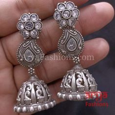 Ethnic Silver Oxidized Indian Trendy Jhumka Earrings Made in Brass with Oxidized Silver Finish Very Elegant and stylish, these earrings can be paired with any traditional Indian or Western Attire depending upon the occasion and the theme. Length: Approx. 2.65 Inches Earrings come with Push Back Closure In-stock & ready-to-ship **Color may vary slightly due to photography and lighting. Pick-up available for this item at 5336 Heather Brook Ln. Glen Allen, 23059, Virginia (Usually ready between 1-3 Jhumka Earrings, Trendy Earrings, Oxidized Silver, Traditional Indian, Pandora Charm Bracelet, Silver Earrings, Virginia, Charm Bracelet, Necklaces