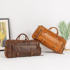 Genuine Leather Travel Duffel Bag. PURE LEATHER: Bags are made of full grain genuine leather. Vintage inspired design combined with the distressed leather gives a rich classy look. Inside of the bag is lined. SIZE: 22''x 11.5'' x 11", Exterior side pockets slot designed for easy access to stow your Shoes, Open Pockets within the front pocket can be a great place for your belongings like mobile phone, wallet, headphones. Use it for a mini vacation, gym or for just running around town. This leathe Luxury Double Handle Saddle Bag For Travel, Leather Duffle Bag With Leather Lining, Leather Duffle Bag With Shoulder Shape, Leather Duffle Bag With Shoulder Strap, Leather Duffle Bag With Shoulder Strap And Leather Lining, Leather Satchel Duffle Bag With Smooth Grain, Leather Satchel Duffle Bag, Rectangular Leather Duffle Bag With Smooth Grain, Brown Large Capacity Bag For Everyday Carry