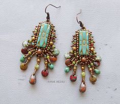 two pairs of earrings with beads and stones