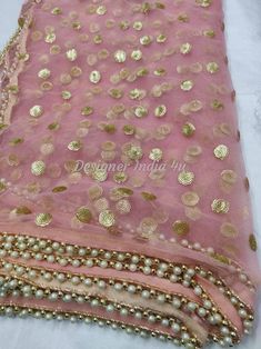 This is a Dupatta made on orders. It is made using dyeable net fabric with gold sequine embroidery all over. We make it colored as shown in the picture. Then we stitch a beautiful golden lace to all sides of it. Dupatta is having a length of 100 inches and width of around 40 inches. I don't keep it readymade I only make it exclusively for my customers. Can be fully customised. Luxury Organza Dupatta For Ceremony, Luxury Pink Tussar Silk Dupatta, Net Dupatta Designs Ideas, Floor Length Dresses Indian, Dupatta For Lehenga, Dupatta Designs Ideas, Duppattas Designs Ideas, Pakistani Salwar Suit, Lehenga Pakistani