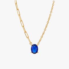 This our exquisite 18K Gold Vermeil Blue Stone Necklace is a true embodiment of elegance and sophistication. This vermeil necklace features a brilliant navy blue stone pendant that exudes a captivating allure. Adding to the uniqueness of this navy blue necklace is the mixed chain design, incorporating the modern simplicity of a paperclip chain with traditional links, providing a contemporary yet timeless appeal. Material: 18K Gold Vermeil Gemstone: Lab Grown Sapphire Necklace Lenght: 16 inches + 2 inches extension chain Adjustable Length Closure: Spring ring Chain: Cable and Paperclip Style: Minimalist Elegant Blue Chain Necklace, Elegant Blue Delicate Chain Necklace, Elegant Blue Necklace With Chain, Elegant Blue Necklace With Cable Chain, Elegant Blue Clavicle Chain Necklace, Blue Clavicle Chain Necklace, Blue Gold-plated Chain Necklace With Adjustable Chain, Blue Adjustable Gold-plated Chain Necklace, Blue Pendant Necklace With Cable Chain