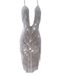 Rhinestone tassel see trough dress with an open back. Evening Dresses With Tassels For Party Season, Backless Fringe Dress For Night Out, Elegant Mini Dress With Tassels For Club, Elegant Tassel Dress For Night Out, Backless Fringe Party Dress, Backless Party Dress With Fringe, Glamorous Backless Fringe Dresses, Club Dresses With Tassels For Party Season, Backless Fringe Mini Dress For Evening