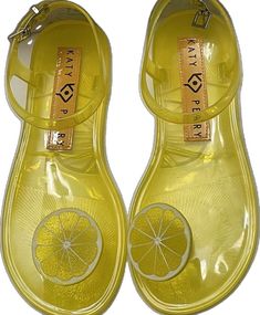 Adjustable Round Toe Jelly Sandals, Trendy Yellow Jelly Sandals For Summer, Trendy Yellow Jelly Sandals For Vacation, Trendy Yellow Jelly Sandals For Spring, Yellow Round Toe Jelly Sandals For Summer, Yellow Round Toe Jelly Sandals For Spring, Trendy Adjustable Jelly Sandals With Round Toe, Adjustable Round Toe Trendy Jelly Sandals, Adjustable Trendy Jelly Sandals With Round Toe