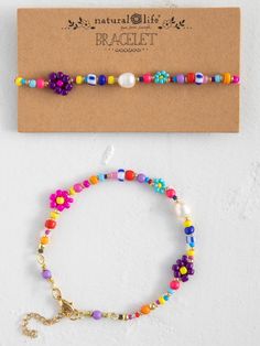 Boho Beaded Daisy & Pearl Bracelet-view 1 Unique Beads Bracelet, Beaded Bracelets Colorful, Multicolor Flower-shaped Beaded Bracelets, Multicolor Flower Shaped Beaded Bracelet, Multicolor Flower-shaped Beaded Bracelet, Multicolor Beaded Pearl Bracelet As A Gift, Multicolor Beaded Pearl Bracelet Gift, Multicolor Beaded Pearl Bracelet As Gift, Spring Beaded Pearl Bracelet With Round Beads