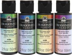 three bottles of dragonfly glaze are lined up in the same color as each other