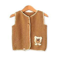 %100 cotton hand knitted baby & kid vest Sleeveless Knitted Cotton Sweater, Cute Cotton Sleeveless Sweater Vest, Knitted Cotton Brown Sweater Vest, Knitted Cotton Sweater Vest In Brown, Knitted Brown Cotton Sweater Vest, Cotton Knitted Sleeveless Vest, Brown Knitted Cotton Sweater Vest, Casual Crochet Cotton Vest, Casual Cotton Crochet Vest