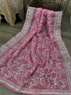 Gorgeous barely pink organza dupatta with silver embroidery and heavy sequins border. Luxury Cutdana Dupatta As A Gift, Pink Heavy Dupatta, Luxury Festive Sequin Fabric With Sheer Dupatta, Cheap Pink Dupatta, Luxury Sheer Dupatta Embroidered Dola Silk Fabric, Silver Saree With Resham Embroidery For Eid, Elegant Silver Dupatta With Chikankari Embroidery, Pink Dupatta With Intricate Embroidery In Traditional Drape, Silver Georgette Dupatta With Resham Embroidery