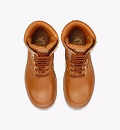 36 IT Visetos Boots in Calf Leather Cognac | MCM ®US Leather Waterproof Boots With Vibram Sole For Streetwear, Leather High Ankle Moto Boots For Streetwear, Leather Moto Boots With Reinforced Heel For Streetwear, Leather Moto Boots With Vibram Sole For Streetwear, Leather Boots With Vibram Sole For Streetwear, Leather Ankle Moto Boots For Streetwear, Leather Moc Toe Boots For Streetwear, Leather Waterproof Boots With High Ankle For Streetwear, Brown Moc Toe Boots For Streetwear