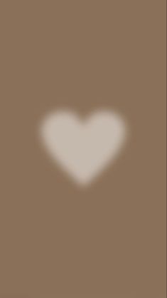 a white heart on a brown background