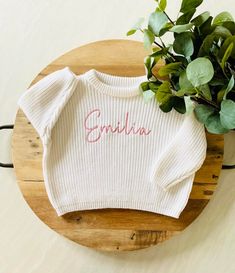 "PERSONALIZED BABY, TODDLER & KID'S EMBROIDERED KNIT SWEATER These customizable sweatshirts are such a beautiful piece to share with the littles in your life. They can also be used for pregnancy and birth announcements and, make an amazing baby shower or birthday gift too! ABOUT ME: *The lettering is unique to each sweatshirt and embroidered in the appropriate sizing. Each name is embroidered with a high-quality polyester embroidery thread. *Cold-wash and hang-to-dry for longevity.  SHIPPING:  *As this product is made to order, the current turnaround time is 3 weeks. Need your order, like, yesterday? No problem, we understand that these things happen, and we're here to help! Simply add our \"Rush My Order\" listing to your cart when you check out, and we'll put a lightning fast expedition Customizable Cute Long Sleeve Top, Cute Customizable Long Sleeve Top, Playful Long Sleeve Customizable Tops, Cute White Customizable Sweatshirt, Cute Customizable White Sweatshirt, Cute Crew Neck Birthday Sweater, Cute Crew Neck Sweater For Birthday, Customizable Cute Crew Neck Sweater, Cute Customizable Crew Neck Sweater