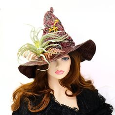 The Tropical Tree Frog Swamp Witch or Wizard Hat will carry you through cosplay, the renfair, a festival costume, a photo shoot, manning a craft market booth, or everyday! The reptile-like coloring is crocheted in silk, linen, cotton, and hand dyed merino to carry you through the year in breathable comfort. The faux reptile vinyl brim is wired and easy to shape. I've crocheted strategic wrinkles for character, with a realistic looking air plant and ferns at the base. A very curious tree frog is creeping down the hat to see what's going on. The textured custom color has a great pebbled bark look and feel, adding to the rustic swampy vibe. This hat is softly shaped, and transforms when you put it on. Folds flat for travel. -This hat has some stretch so it will fit between 21" to 23.5" head c Novelty Costume Hat With Curved Brim, Themed Curved Brim Hats For Costume Party, Themed Hats With Curved Brim For Costume Party, Themed Cap For Costume Party, Curved Brim Costume Hat, Costume Hat With Curved Brim, Novelty Costume Cap Hat, Novelty Wide Brim Costume Hat One Size, Themed Mini Hat With Curved Brim For Costumes