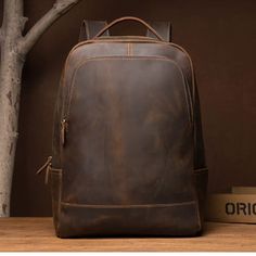 Introducing the epitome of timeless elegance - our Genuine Cowhide Leather Backpack! 🌟🎒 Material that matters: 🐄 Crafted from 100% genuine cowhide full-grain top-layer leather, this backpack not only exudes classic charm but promises durability that stands the test of time.  Choose your style: 🎨 Available in two sophisticated colors - rich brown and sleek black. The brown variant, measuring 43 x 31 x 13cm, comfortably fits a 15.6-inch laptop, while the black version, measuring 43 x 15 x 31cm Vintage Laptop Bag, Womens Rucksack, Hipster Backpack, Leather Travel Backpack, Vintage Leather Backpack, Leather Backpack For Men, Mens Backpack Travel, Handmade Backpacks, Backpack Gift