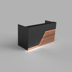 a black and wood desk top on a gray background