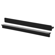 two black shelf brackets on a white background