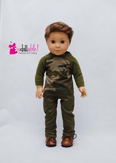 the doll is wearing camouflage clothing and sandals