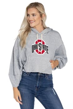 Dare to be bold with these oversized balloon sleeves. Pair this Ohio State Buckeyes cropped hoodie with leggings for an athletic look or dress it up with some cute jeans. Features balloon sleeves, kangaroo pocket, and raw edge finish. 53% poly, 47% cotton. Made in the USA. NCAA officially licensed. Hoodie With Leggings, Ecu Pirates, Mississippi State Bulldogs, Ole Miss Rebels, Washington State Cougars, Missouri Tigers, Texas Tech Red Raiders, South Carolina Gamecocks, Athletic Looks