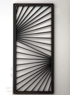 an abstract metal art piece hanging on the wall