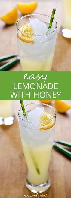 two glasses filled with lemonade sitting on top of a wooden table