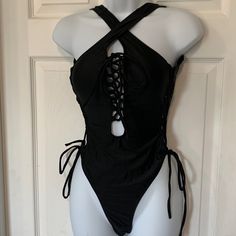 New Never Used Black Cross Cross Detail Straps Can Be Used In Multiple Ways As Shown Above Goth One Piece Swimsuit, Alternative Bathing Suits, Black Cross-tied Beachwear Swimwear, Spring Black Strappy Swimwear, Black Strappy Swimwear For Spring, Emo Bathing Suits, Gothic Bathing Suits, Alt Swimwear, Black Swimsuit Aesthetic