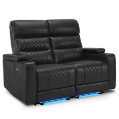 a black leather reclining sofa with blue lights on the arm and headrests