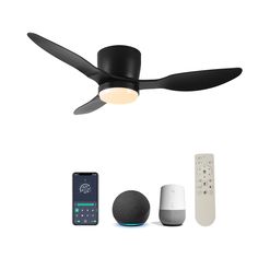 a black ceiling fan with remote controls and other items around it on a white background