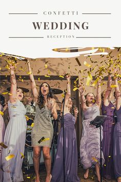 a group of women standing next to each other on top of a stage with confetti in the air