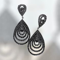 Clip-on Round Hoop Earrings For Evening, Black Drop Clip-on Earrings For Evening, Elegant Hoop Earrings For Party, Black Clip-on Dangle Jewelry, Black Dangle Clip-on Jewelry, Black Drop Clip-on Earrings For Party, Glamorous Teardrop Hoop Earrings For Pierced Ears, Evening Hoop Single Earring, Glamorous Teardrop Hoop Earrings