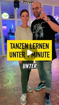 a man and woman standing next to each other in front of a tv screen with the words tanzen lernen under minute