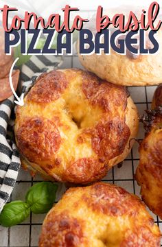 three pizza bagels on a cooling rack with basil leaves around them and the words tomato basil pizza bags