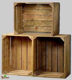 three wooden crates stacked on top of each other with one open and the other closed