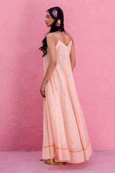 Peach sleeveless A-line maxi dress crafted in cotton kota with all over strawberry wonder embroidery. - Aza Fashions Pink Sleeveless Maxi Dress With Floral Embroidery, Sleeveless Apricot Maxi Dress For Spring, Sleeveless Pink Maxi Dress With Floral Embroidery, Spring Sleeveless Apricot Maxi Dress, Peach Dresses With Floral Embroidery, Pink Chikankari Embroidery Maxi Dress, Pink Maxi Dress With Chikankari Embroidery, Sleeveless Cotton Dress With Chikankari Embroidery, Spring Maxi Dress With Chikankari Embroidery