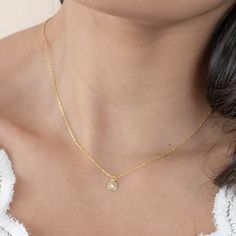 add a classic touch to your everyday style with our 'until I found you necklace'. this dainty, dreamy piece is perfect for everyday layering and the perfect accessory for any occasion - from a casual brunch with friends to a formal meeting. its timeless design ensures it will remain a staple in your wardrobe for years to come. demi-fine 18k gold or rhodium over sterling silver 15" long with a 2" extender chain is 1mm thick pendant is 6mm round Delicate Everyday Charm Necklace With Initial Pendant, Delicate Everyday Charm Necklaces With Initial Pendant, Dainty Charm Necklaces With Initial Pendant For Everyday, Simple Everyday Initial Pendant Necklace, Everyday Delicate Charm Necklace With Delicate Chain, Delicate Everyday Necklace With Initial Pendant, Delicate Initial Necklace For Everyday Wear, Minimalist Tiny Charm Necklaces For Everyday, Dainty Everyday Initial Necklace With Round Pendant