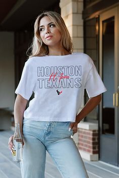 This boxy fit crop tee featuring the Houston Texans logo is perfect for any fan or game day outfit. Made with soft, breathable fabric, it offers a comfortable and stylish way to show off team spirit. Support the Texans while staying cool and trendy. Sporty White Cropped T-shirt With Logo Print, White Relaxed Fit Cropped T-shirt With Text Print, White Relaxed Fit Cropped T-shirt For Streetwear, White Cropped T-shirt With Text Print, Relaxed Fit, White Cropped T-shirt With Letter Print, Crew Neck, White Cropped Crew Neck T-shirt With Letter Print, White Logo Print Crew Neck Crop Top, White Sporty Cropped Shirt For Streetwear, White Crew Neck Crop Top With Logo Print