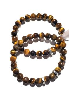 "8mm Brown Tiger's Eye Gemstones 1/4\" Stainless Steel Nuts Self-Confidence and Inner Strength -- Tiger's Eye is a highly motivational stone and pushes you to move past any boundaries you have set for yourself.  It challenges you to explore the unknown in life, even if it gets uncomfortable.  When you start to feel afraid or unsure, Tiger's Eye will remind you of your inner strength and capabilities.   It will boost your self-confidence and allow you to persevere, even when it might be easier or Jewelry Stack, Stack Bracelets, Brown Tiger Eye, Tigers Eye Gemstone, Stacked Jewelry, Tigers Eye, Tiger's Eye, The Unknown, Inner Strength