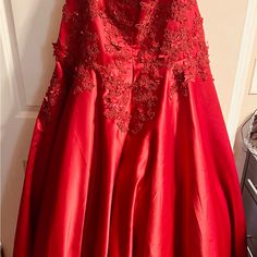 Ball Room Style Gown. Bought For A Wedding But Was Never Worn Because It Was Big Red Gown For Debutante Ball, Red Floor-length Gown For Debutante Ball, Red Carpet Ball Gown With Fitted Bodice, Red Evening Dress With Sweetheart Neckline For Debutante Ball, Red Ball Gown With Fitted Bodice For Wedding, Red Satin Ball Gown With Fitted Bodice, Red Ball Gown For Debutante Ball, Red Ball Gown With Sweetheart Neckline And Sweep Train, Red Fitted Bodice Evening Dress For Debutante Ball