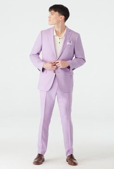 Stare deep into the eye of the bird and let this mesmerizing spring suit speak to you. It's soft diamond-like texture adds interest to an otherwise standard suit and the color gives it a fresh spring feel. Spring Wedding Suits With Suit Collar, Slim Fit Wedding Suits For Spring, Spring Wedding Slim Fit Suit, Spring Fitted Tuxedo For Formal Occasions, Spring Formal Fitted Tuxedo, Luxury Fitted Suits For Spring, Elegant Slim Fit Spring Sets, Spring Suits With Pressed Crease, Elegant Spring Suits With Pressed Crease