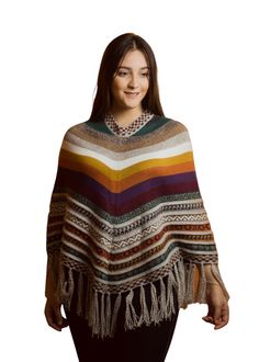 Looking for a gift that will make you feel special? For that good friend or someone special Beautifully woven, incredibly soft, and silky-smooth texture. Our warm alpaca wool poncho, is sure to chase the winter blahs away, available in different colors! Hand-made in Perú by Awki Alpaca and her team of artisans. They put years of creativity and high-quality work into each of their beautiful designs. You won’t be just wearing a fashionable piece, but also some of Peru’s treasures and mysteries, re Multicolor Bohemian Wool Poncho, Multicolor Cape Poncho For Fall, Multicolor One Size Poncho For Fall, One Size Multicolor Poncho For Fall, Cozy Alpaca Shawl For Fall, Multicolor Poncho Shawl For Winter, Multicolor Shawl Poncho For Winter, Multicolor Shawl Poncho For Fall, Cozy Alpaca Shawl One Size