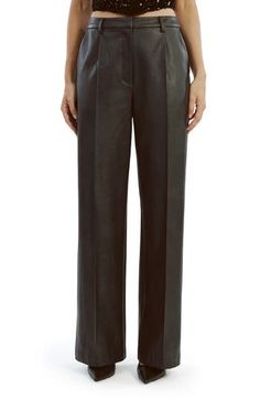 A bit of stretch and wide legs keep you comfy in faux leather pants that bring edgy-but-understated vibes to night-out ensembles 31" inseam; 21 1/2" leg opening; 11 1/2" front rise; 15" back rise Zip fly with hook-and-bar closure Front slant pockets Unlined 100% polyester with polyurethane coating Hand wash, line dry Imported Fall Wardrobe Essentials, Sports Blazer, Made Clothing, Faux Leather Pants, Wide Legs, Denim Jumpsuit, Kids Sweater, Pant Shirt, Comfortable Dress