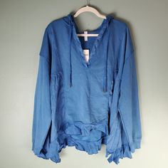 Anthropologie Daily Practice The Sapphire Hoodie Oversized Slouchy Blue Size Xl New With Tags. Fabric Flaw As Shown In 4th Photo Shark Bite Hem Oversized Slouchy Fit V-Neck Pullover Styling Blue Lagenlook Tops With Relaxed Fit, Oversized Washed Blue Winter Top, Blue Oversized Cozy Sweatshirt, Oversized Washed Blue Tops For Winter, Blue Cozy Oversized Sweatshirt, Oversized Blue Hoodie With Long Sleeves, Cozy Oversized Blue Sweatshirt, Oversized Cozy Top With Drawstring Hood, Blue Hooded Tops For Fall