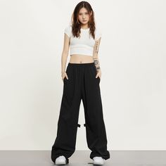 5ft 4''(166cm) tall, 95 lbs(43kg) weight and wearing a size S - BLACK- Wide baggy fit Casual Oversized Wide Leg Pants For Streetwear, Black Baggy Wide Leg Pants For Streetwear, Baggy Black Wide Leg Pants For Streetwear, Oversized Urban Black Bottoms, Black Full-length Bottoms For Streetwear, Solid Color Wide Leg Hip Hop Pants, Black Full Length Bottoms For Streetwear, Black Wide Leg Pants For Streetwear, Solid Color Wide Leg Sweatpants For Streetwear