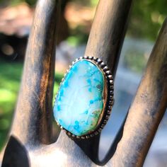 This Is A Gorgeous Piece Of Agate That Has Been Dyed Blue Around Its Edges And Set In 925 Sterling Silver. This Is An Older Original Piece Made In 2015 When I Was Learning To Fashion Rings Out Of Raw Materials. Please Ask Questions And Make An Offer. I Can't Say Yes If You Don't Ask! Sterling Silver Turquoise Ring For Healing With Natural Stones, Unique Turquoise Larimar Gemstone Ring, Unique Turquoise Larimar Ring, Healing Sterling Silver Turquoise Ring, Bohemian Blue Larimar Jewelry, Healing Rings With Natural Stones, Turquoise Chalcedony Ring Jewelry, Blue Bohemian Opal Ring In Sterling Silver, Bohemian Blue Opal Ring In Sterling Silver